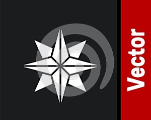 White Wind rose icon isolated on black background. Compass icon for travel. Navigation design. Vector Illustration