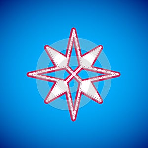 White Wind rose icon isolated on blue background. Compass icon for travel. Navigation design. Vector