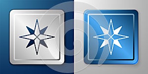 White Wind rose icon isolated on blue and grey background. Compass icon for travel. Navigation design. Silver and blue