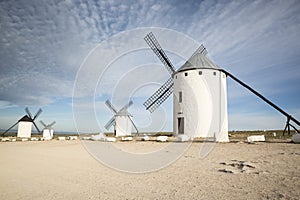 White windmills in Campo de Criptana town, province of Ciudad Real, Castilla-La Mancha, Spain photo