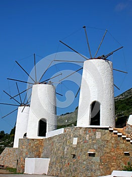 White windmills on the island Crete in Greece