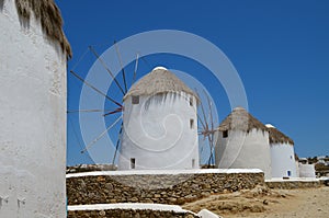 White windmills on the island of Mykonos. Greece