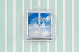 White Window and Cloudy Sky Background on Grunge Wall