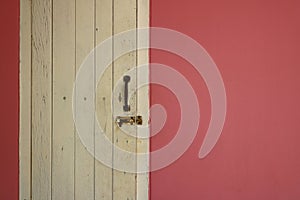 White window on pink wall