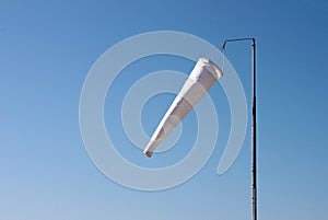 Windsock against a blue sky