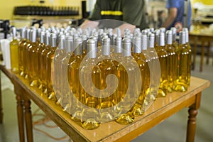 White wine bottles in a winery