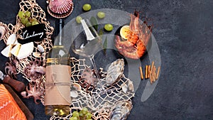 White wine Chardonay with seafood and snacks photo