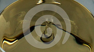 White wine drop goblet closeup. Alcohol beverage droplet fall splashing smooth