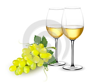 White wine glasses and grapes.