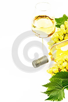 White wine and grapes. Isolated white background.