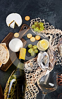 White wine Pinot Grigio with seafood and snacks