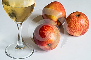 White wine and red apples