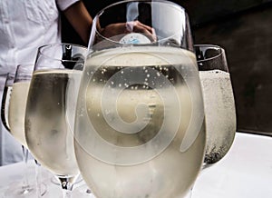 White wine spritzer in glasses on a table