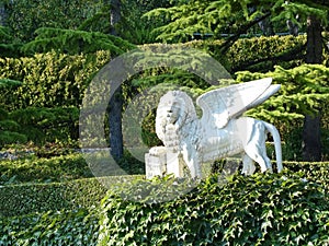 White winged marble `lion of St. Mark` in the Park of Yusupov Palace. The Palace was built in the style of the modernized Italian