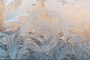 White wintry hoarfrost background on a window