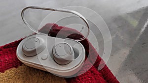 White wireless bluetooth earphones or headphones