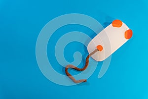 White wireless mouse on blue background