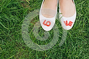 White woman shoes with red LOVE letters