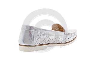 White women`s low-heeled shoes on a white background