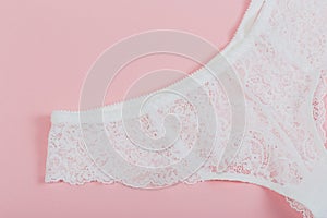 White women underwear with lace on pink background. whitebra and pantie.Copy space. Beauty, fashion blogger concept. Romantic