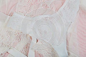 White women underwear with lace on pink background. whitebra and pantie.Copy space. Beauty, fashion blogger concept. Romantic