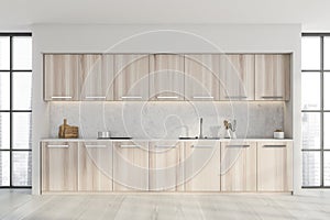 White wood kitchen cabinet on panoramic background