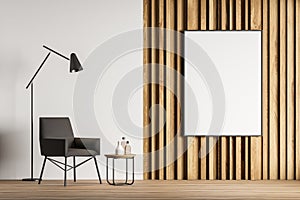 White and wood living room, armchair and poster