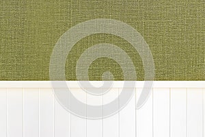 White wood wall with green texture wallpaper