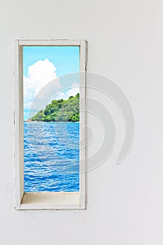 White wood wall window with sea beach view.