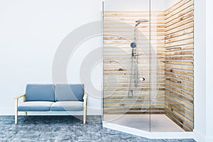 White and wooden bathroom interior, shower, sofa