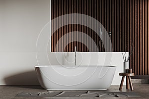 White and wooden bathroom interior with tub and shower