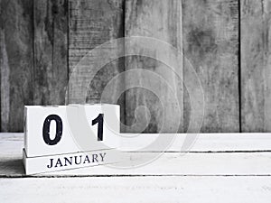 White wooden block calendar show date 01 and month January on wood background