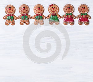 White wooden boards with Christmas cookies on upper border