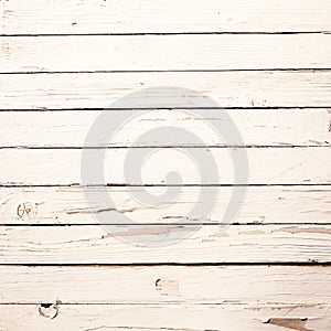 White wooden boards with peeling paint