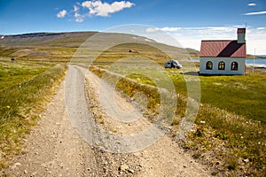 White wooden church in Unadsdalur - Iceland photo