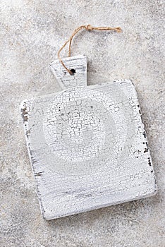 White wooden crackle cutting board