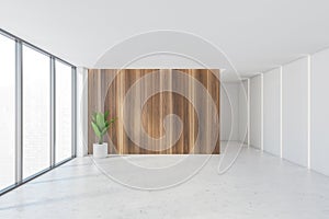 White and wooden empty reception hall, white floor near windows