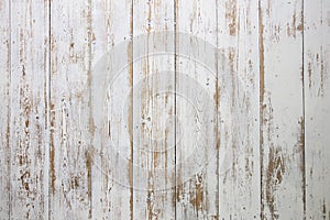 White wooden floorboards. Distressed worn floorboard background painted white