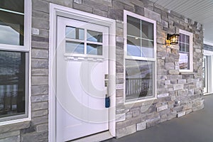 White wooden front door with sash windows