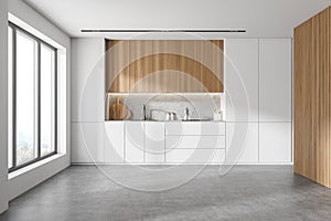 White and wooden kitchen with cupboards