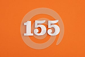 White wooden number 155 on eva rubber orange background