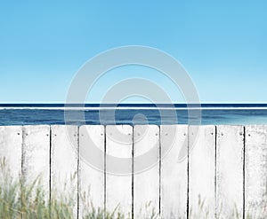 White Wooden Plank Fence on Beach