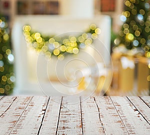 White wooden planks against blurred christmas lights