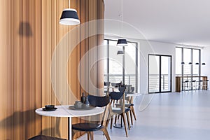 White and wooden round restaurant corner