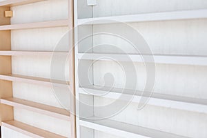 White Wooden Shelf on a Wall in Light Room