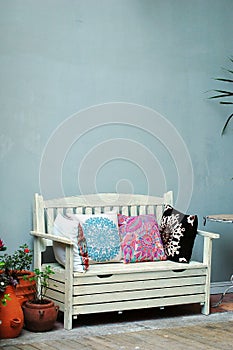 White wooden sofa in a family inn photo