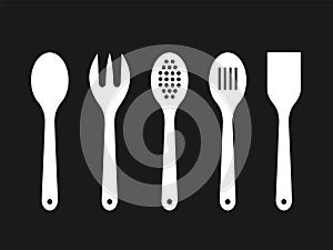 White wooden spoons on black background. Silhouettes of mixing spoon, spatula, fork, strainer.