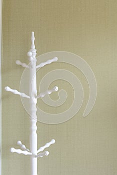 White wooden standing cloth rack