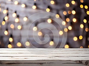 white wooden table with blurred Christmas lights on background