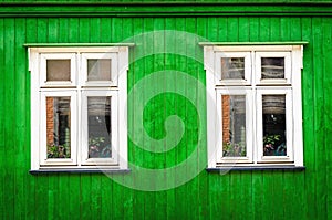 White wooden window with green front